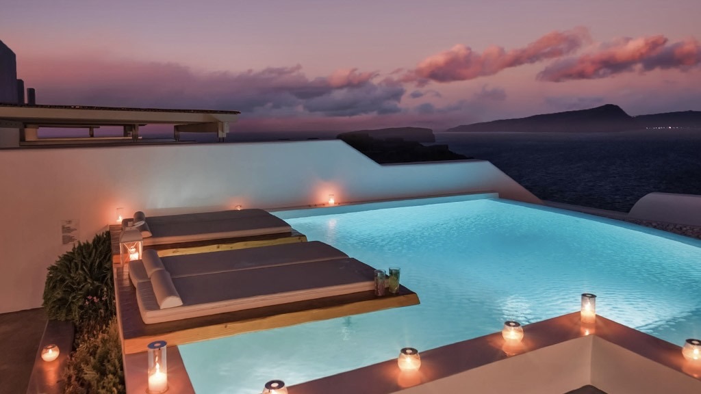 Phōs the Boutique Luxury Hotel & Villas pool at night at one of tge best boutique hotels in Santorini